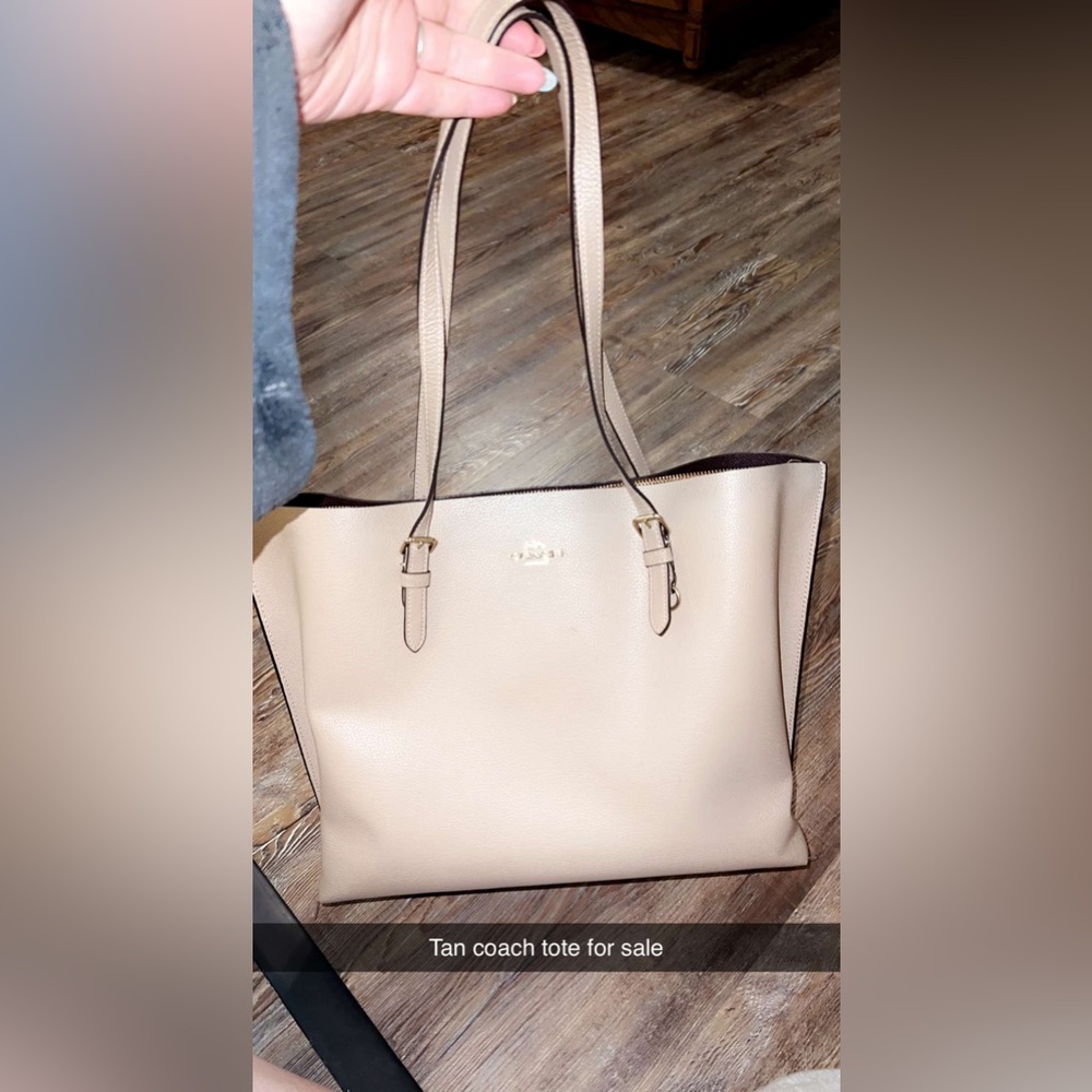 Tan coach